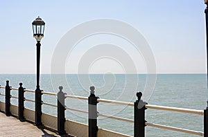 Streetlamp on pier at Worthing. Sussex. England