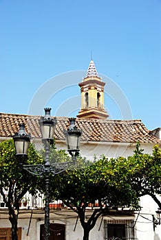 Streetlight and church tower, Estepona. photo