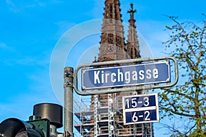Streetname Kirchgasse - engl: church street - downtown Wiesbaden with church in background