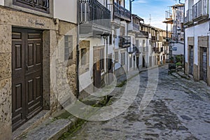 Streets and architectural facades of Candelario Salamanca, Spain photo