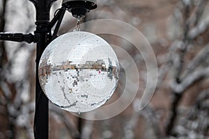 Streets decorated with mirror balls or disco balls for a Christmas event, closeup