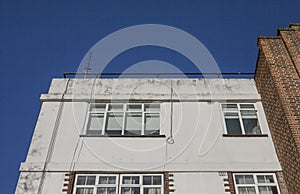 Streets of London - modern flats and blue skies on a sunny day.