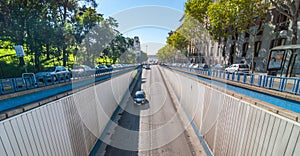 Streets of Madrid, Spain, Calle del Alfonso tunnels under in the heart of the city.