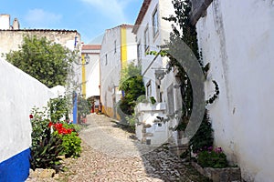 In the streets of the medieval fortified town Obidos in Portugal