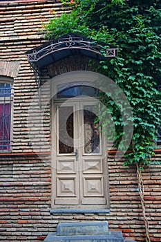 Streets of old Tbilisi Georgia: beautiful wooden door photo