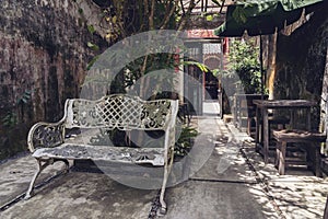 The streets of the old town of Takua pa, Phang Nga province, a cozy place in the shade, a shop in shabby walls, the