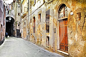 Streets of old Tuscany, Italy photo