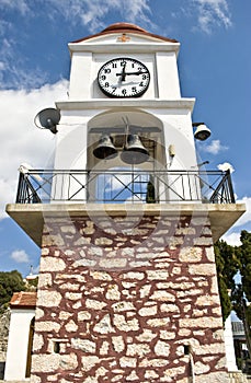 Streets of Skiathos island in Greece, clock tower