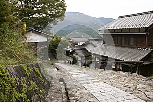 Streets and traditional Japanese houses at Magome Juku town along the Nakasendo trail in Kiso Valley, Japan.