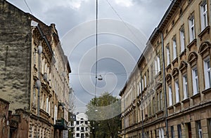 Streetscape street of historic Lviv city with old vintage buildings in old town. Ukraine