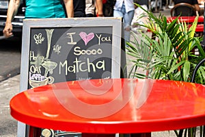 Streetside Cafe table in New York City with chalkboard