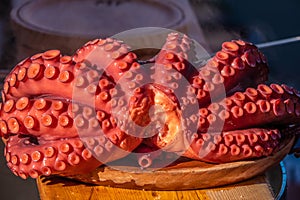 Streetside stalls oferring fresh boiled octopus, Pontevedra, Gallicia, Spain photo