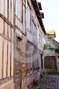Streetview in the old town of Honfleur with its typical facades of Norman houses.