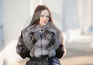 Strelnikova_Svetlana. Woman fur coat and black leather gloves