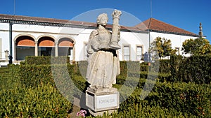 Strength, allegoric sculpture in the Garden of the Episcopal Palace, Jardim do Paco, Castelo Branco, Portugal photo