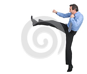 Strength and authority. Full length of angry businessman imitating a fight standing against white background