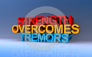 strength overcomes tremors on blue photo