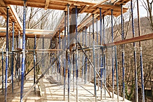 Strengthening the foundation of the second floor of the house with metal racks