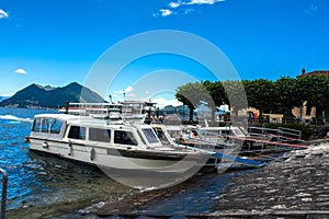 Stresa view on Boats and yachts, parked in docking bay on the Maggiore Lake.