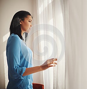 Stress, african woman, looking at living room window with anxiety, confused and worry. Curious, female person and
