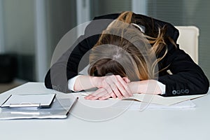 Stress deadline overworking exhausted woman desk