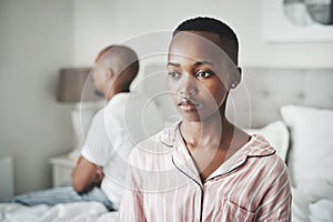 Stress, depression and insomnia, black couple on bed in home angry after argument or fight. Mental health, relationship