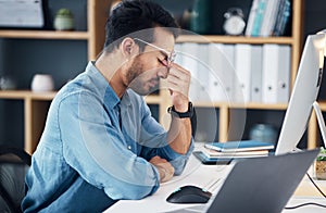 Stress, headache and tired man on computer with career burnout, anxiety or mental health risk in office. Sad business