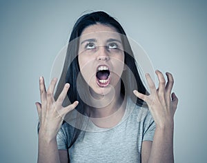 Stress and mental health, Beautiful young woman with angry face looking furious and desperate