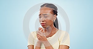 Stress, scared black woman and paranoid with fear and anxiety with blue background. Studio, female person and terror