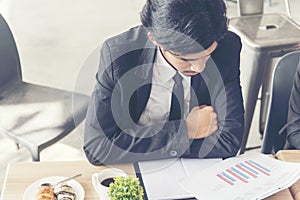 Stress young businessman being serious busy failure jobs can`t work under pressure or stress situation. Financial crisis stressfu