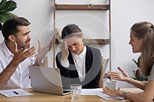 Stressed annoyed office employee having headache migraine at business meeting