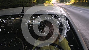 Stressed annoyed woman driver sitting inside broken car. Angry female driver driving a car.