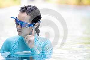Stressed asian girl had tinnitus,problem with water entering the ear canal while swimming,female people cleaning ears after diving photo