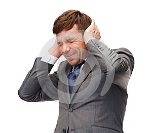 Stressed buisnessman or teacher closing ears