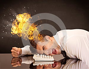 Stressed business man's head is burning