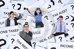 Stressed business people standing with tax problem