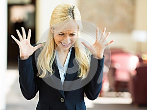 Stressed business woman in corporate office