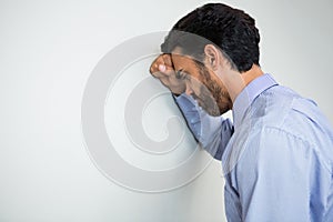 Stressed businessman at conference centre