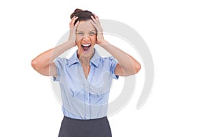 Stressed businessswoman with hand on her head