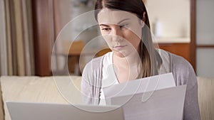 Stressed businesswoman crumpling piece of paper. Frustrated professional female throwing documents