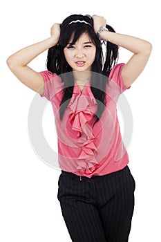 Stressed businesswoman grabbing her hair