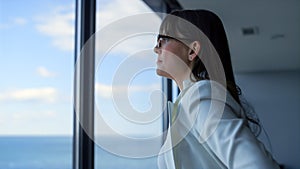 Stressed businesswoman looking window closeup. Tired manager consider problems