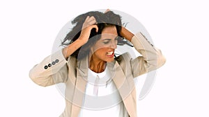 Stressed businesswoman tossing her hair