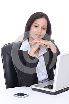 Stressed businesswoman using laptop computer