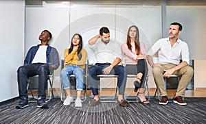 stressed diverse people waiting for job interview