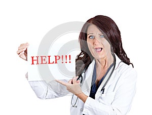 Stressed doctor holding help sign