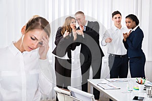 Stressed Female Colleague In Office photo