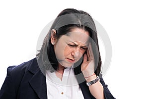 Stressed female entrepreneur touching temple as migraine concept