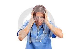 Stressed female hospital nurse grabbing head because of pain