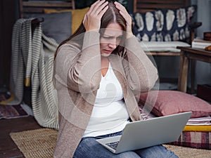 Stressed forgetful middle aged woman at home